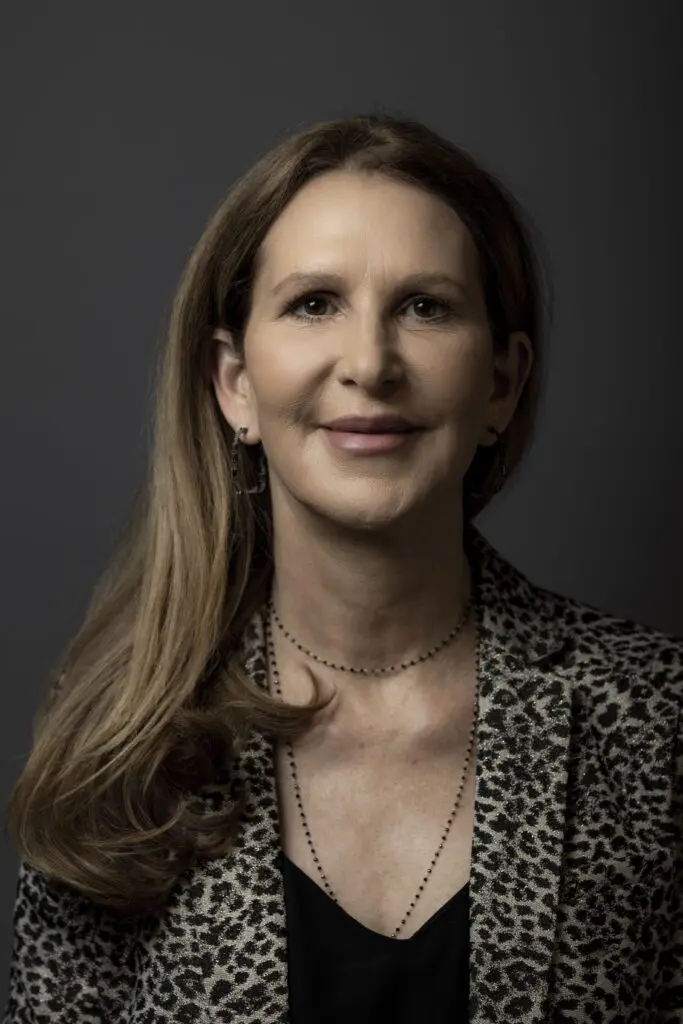 Color portrait of Kim Cullen, smiling and facing the camera