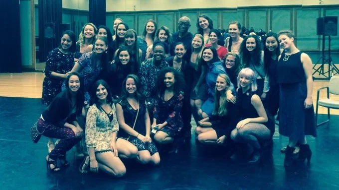 The Loyola Marymount University dance company posing in a studio with Bill T Jones.